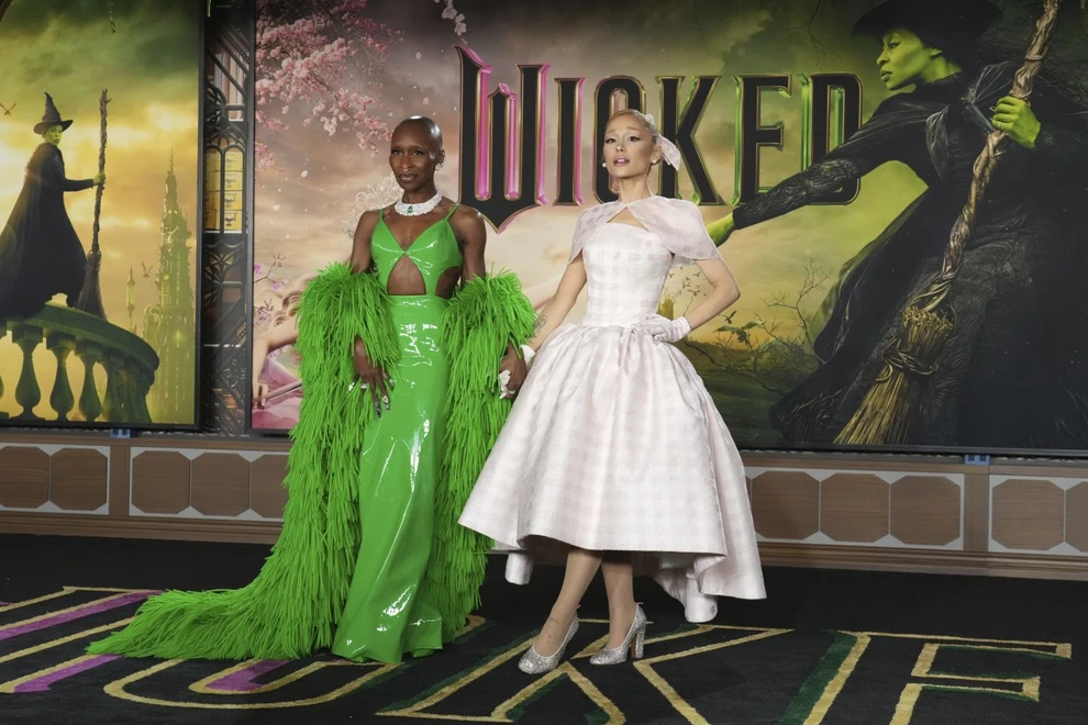 Cynthia Erivo, left, and Ariana Grande arrive at the premiere of “Wicked” on Saturday, Nov. 9, 2024, at Dorothy Chandler Pavilion in Los Angeles. In “Wicked,” Elphaba and Glinda travel from Shiz University to the Emerald City on a glistening green train to meet the wizard. In real life, Cynthia Erivo and Ariana Grande have traveled much farther and wider and longer and on airplanes to promote their hotly anticipated film. (Photo by Jordan Strauss/Invision/AP)