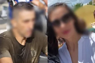Γυναίκα που κρατάει ένα τηλέφωνο