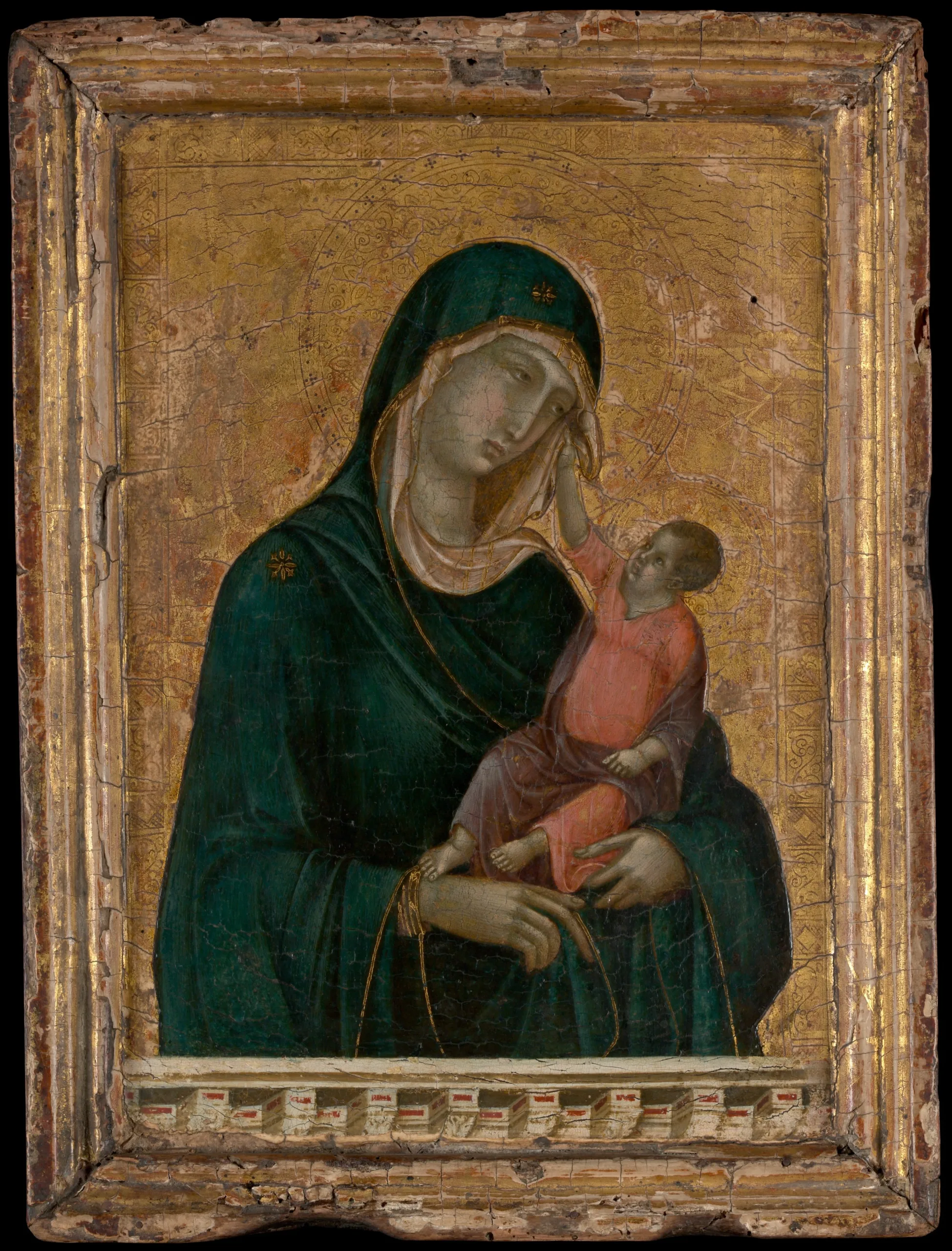 Από το «Like a Prayer» στο Met Gala: Πώς η Παναγία πέρασε στην ποπ κουλτούρα Η Παναγία με το Θείο Βρέφος σε έργο του Duccio di Buoninsegna με χρυσό φόντο.